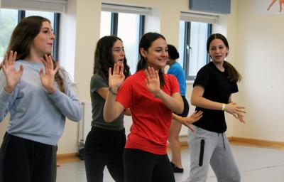 group of teenage girls in dance class at summer camp