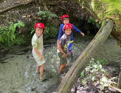 three boys doing bridgebuilding at XUK Excel Summer camp