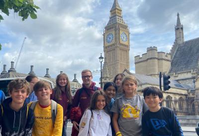 group of children and XUK summer camp staff members in front of Big Ben