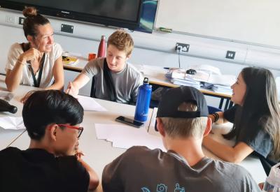 group of students and teacher in class at XUK English Summer Schools